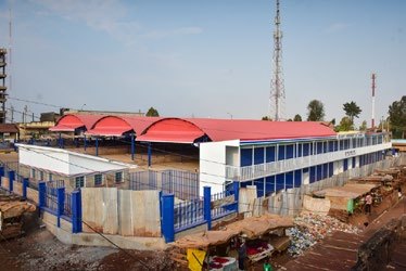 Construction of Kigumo Modern Market, Open Sheds, Modern Kiosks, Underground Water Tank, Perimeter Wall, Cabro Parking and Driveways.